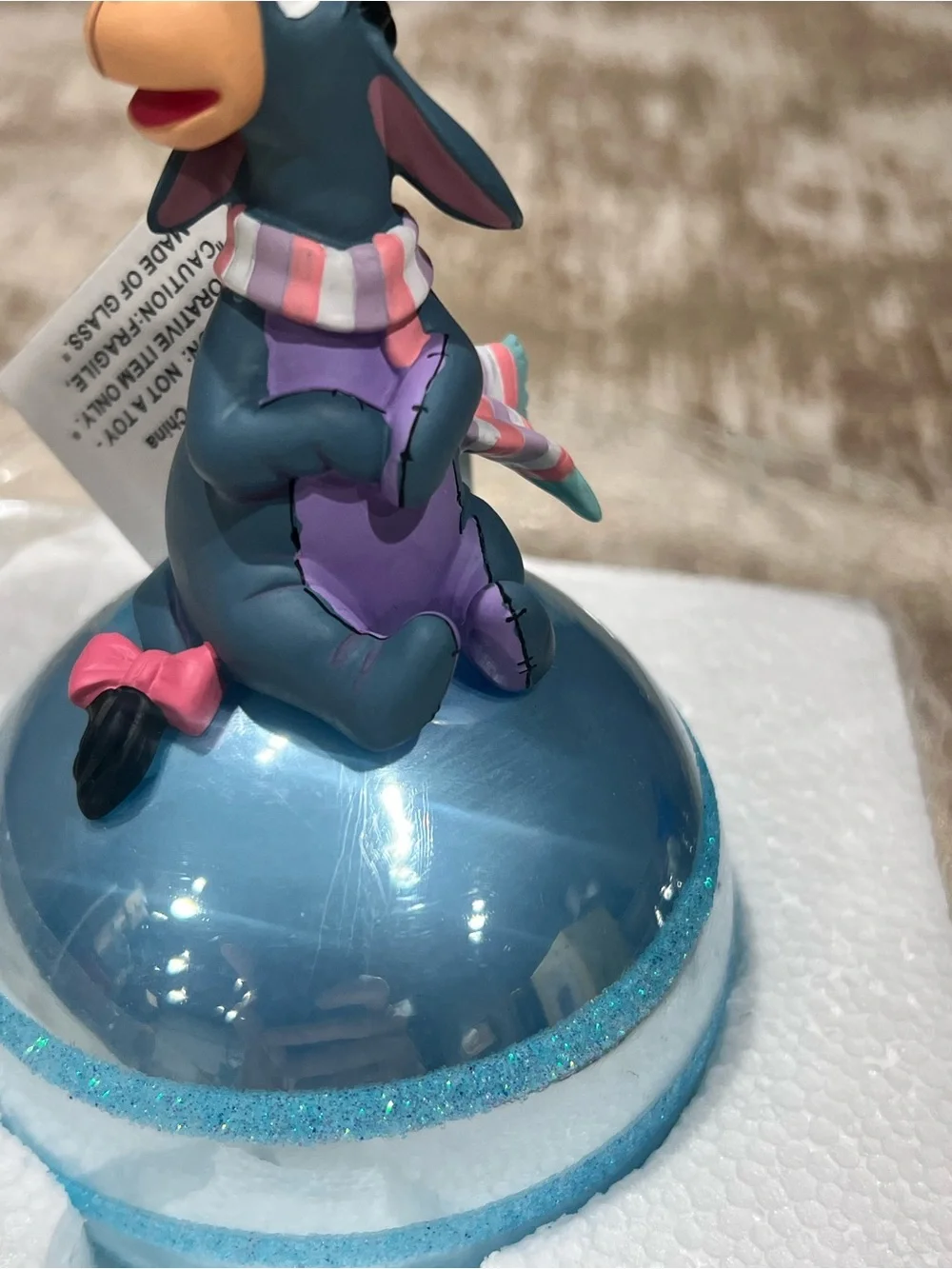 Disney eeyore perched